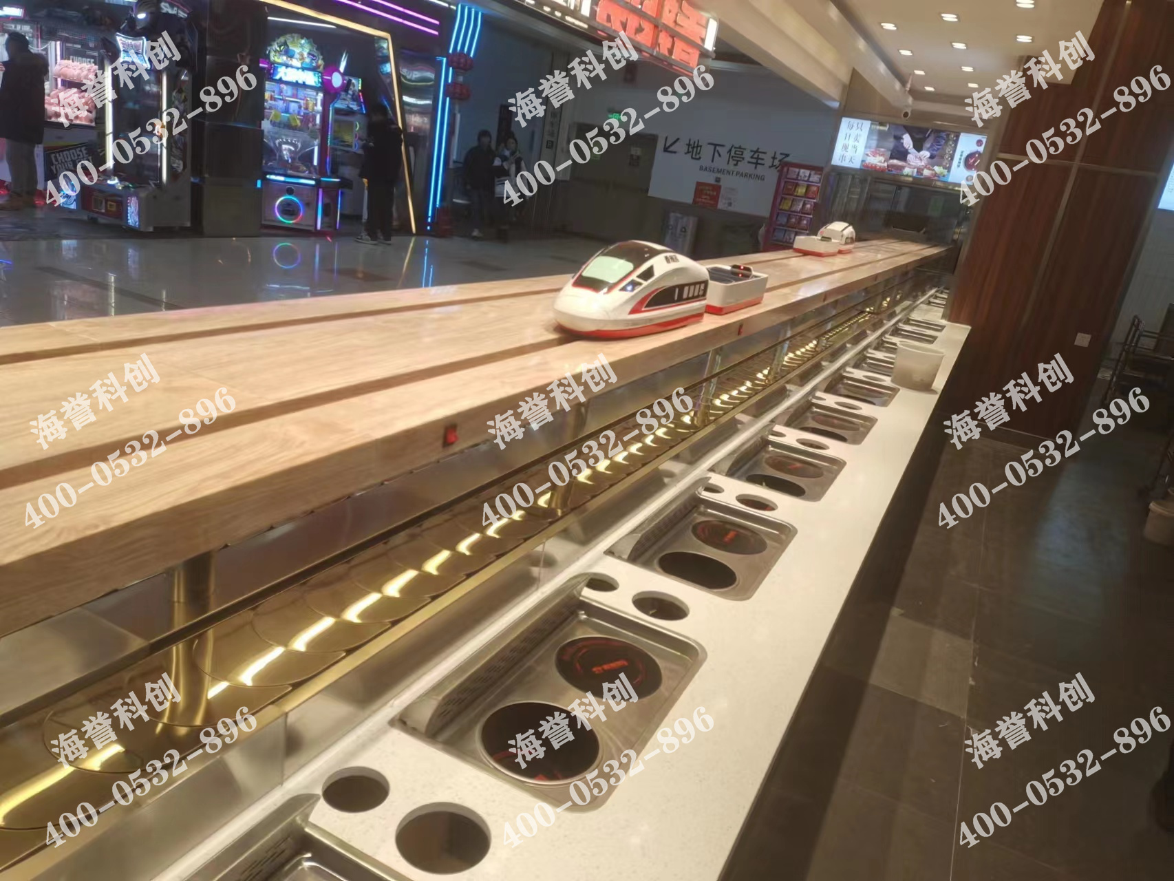 海誉科创内蒙古通辽涮烤一体小火锅搭载智能送餐小火车安装完成